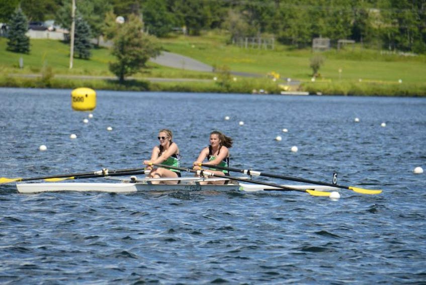 Molly Rainnie, left, and Caroline Tweel competed in the double sculls rowing event Tuesday at the Canada Games.