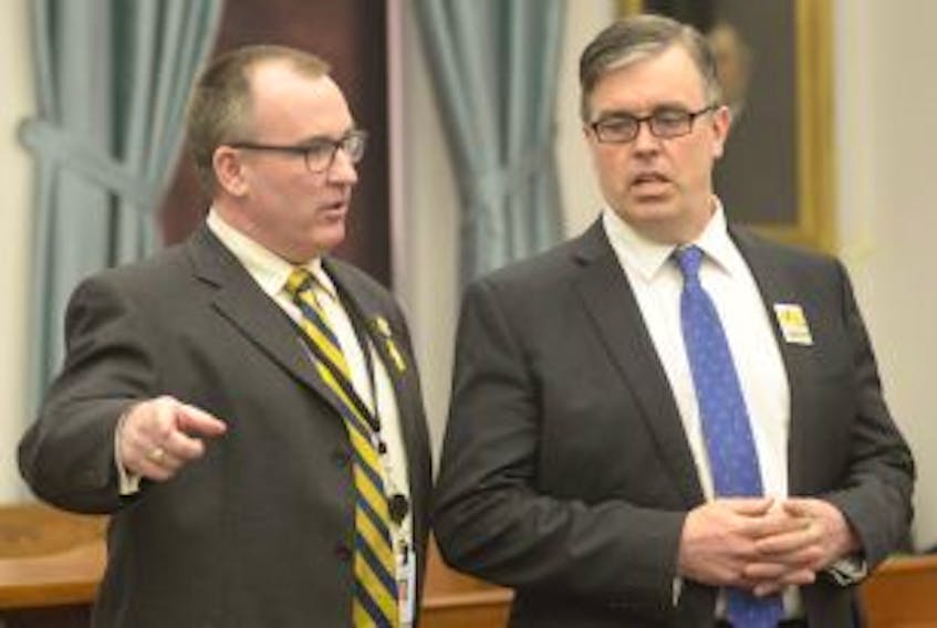['Liberal MLA Chris Palmer, left, and PC MLA Steven Myers are among a half-dozen P.E.I. MLAs who have part-time jobs in the private sector. \n']
