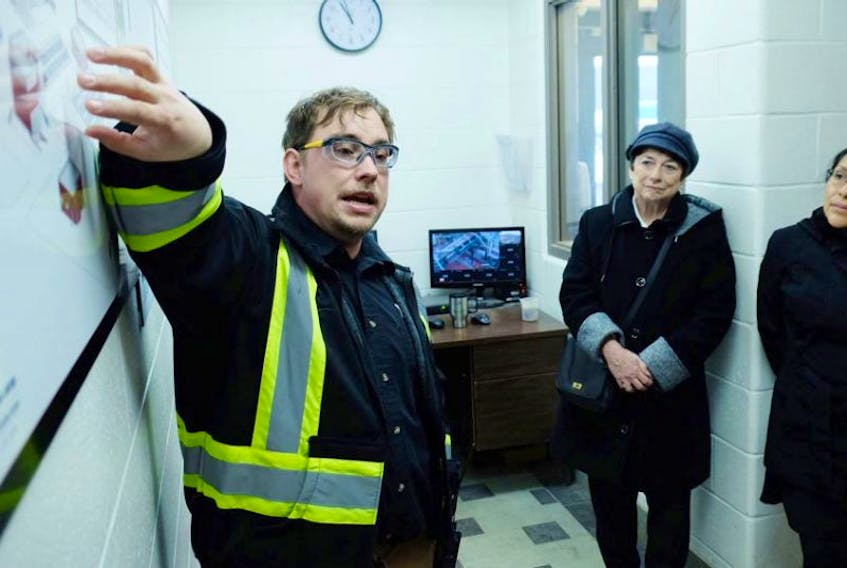 Sam Arsenault, Summerside’s waste water operations supervisor, explains how water is treated at the city’s waste water treatment plant as Senator Diane Griffin and Senator Rosa Gálvez listen.