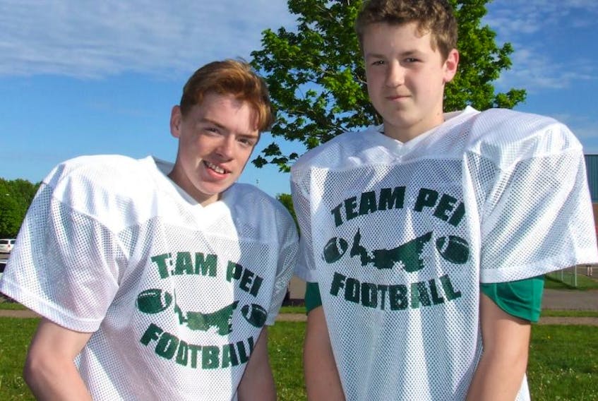 Dominic Green, left, and Steven Acorn are two members of the new provincial under-16 six-man tackle football team. The 14-years-olds play in the P.E.I. Tackle Football League for Cornwall and Kings County, respectively, and joined the provincial program to advance their skills leading into the fall season.