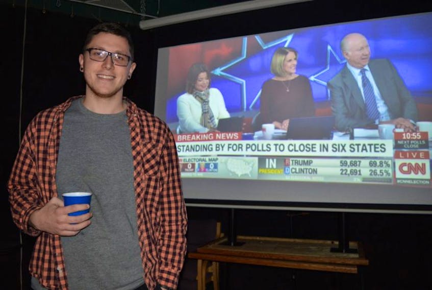 Stephen Wilfeard, of Upstate New York, sat with a group of friends at The Wave anxiously waiting as the election results poured in Tuesday night. Wilfeard mailed out his ballot two weeks ago and voted for Hillary Clinton.