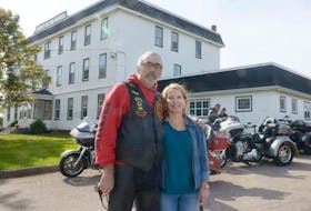 Dianne Young, chair of Lennon Recovery House Association, and Thanks for Giving motorcycle run organizer Donnie Aitken stand outside the recovery centre in South Rustico following the run on Saturday. About 150 motorcyclists helped raise more than $1,500 through the run.