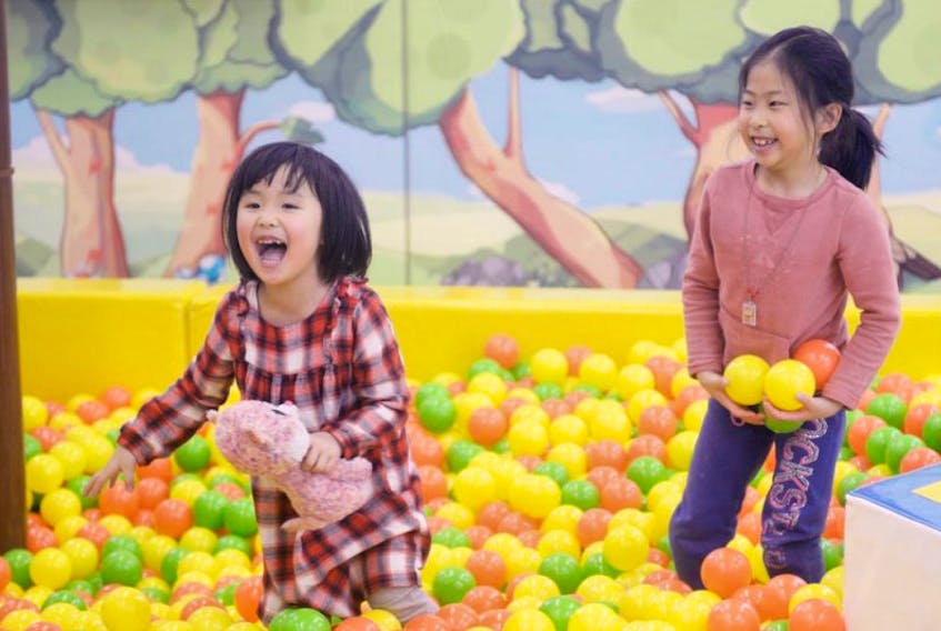 Angela Zhu and Troranda Zhong play in the ball pit at Panda Fun playland in Charlottetown. The playland is set to open later this month and hosts a number of activities for children and adults.