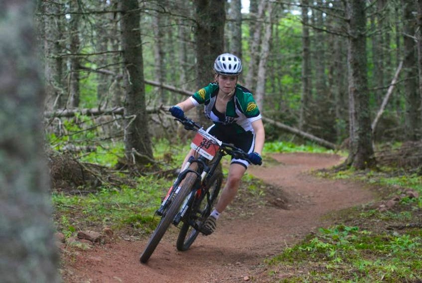 Stanley Bridge’s Marilyn Sheen races in the Tour de Pants Sunday at the Brookvale Nordic Park. The event is the third stage of the Cycling P.E.I. Citizen Mountain Bike Series.
