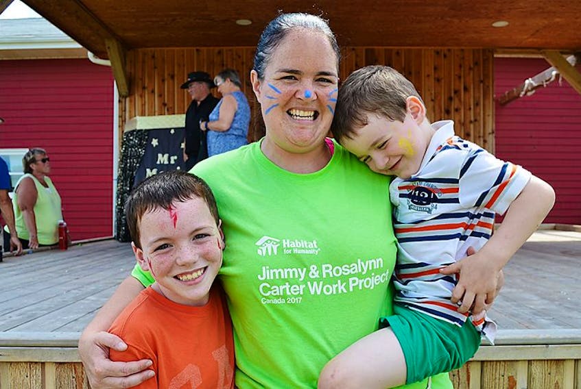 Deanna Lowe and her two sons, Cameron Lowe, left, and Cory MacLean, enjoy themselves in North Rustico recently for That Fun Day. This event was held in celebration of the Habitat for Humanity initiative to build 150 homes across the country for Canada’s 150th birthday and Habitat for Humanity P.E.I.’s contribution to this project.
