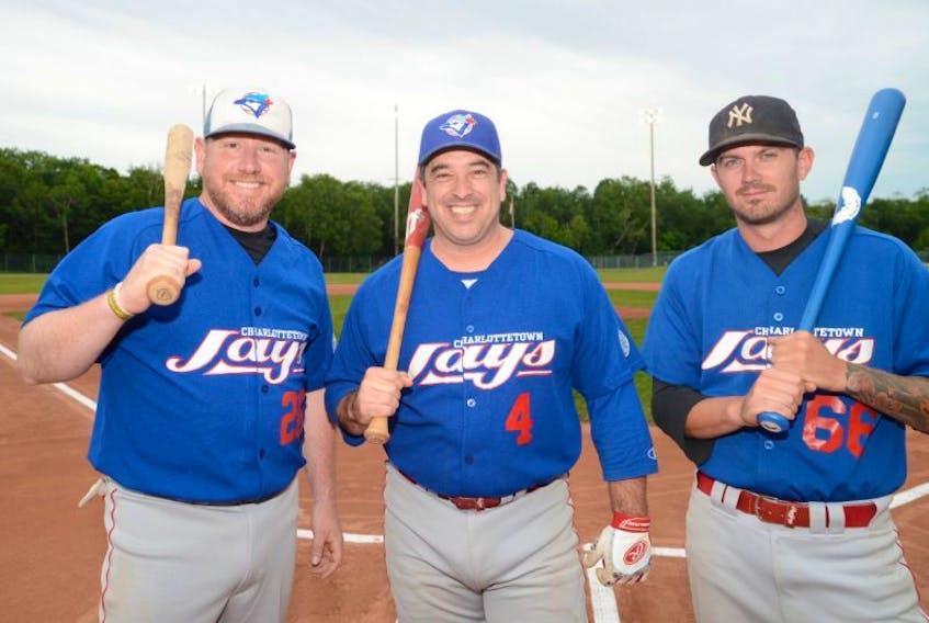 The Charlottetown Jays is an old-timers team playing in the Kings County Baseball League. From left are Greg Stapleton, Craig Cooper and Brodie Hughes, who is one of the youngest members of the squad.