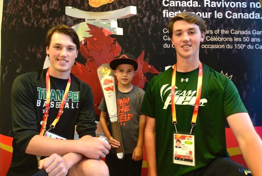 Kane Johnson, centre, got to meet brother Logan, left and Ben MacDougall during a Canada Games Activity Challenge event Saturday in Winnipeg. All three are from Summerside.