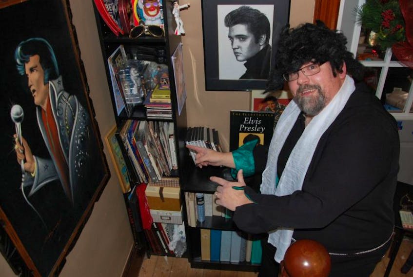 Wade Czank, president and founder of the Elvis Presley Association of P.E.I., displays his Elvis memorabilia at his home in Uigg, P.E.I. in 2015.