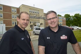 Kenny MacDougall, right, headmaster, and Stephen Champion, director of curriculum development, are busy preparing to open the Mount Academy this fall in Charlottetown.