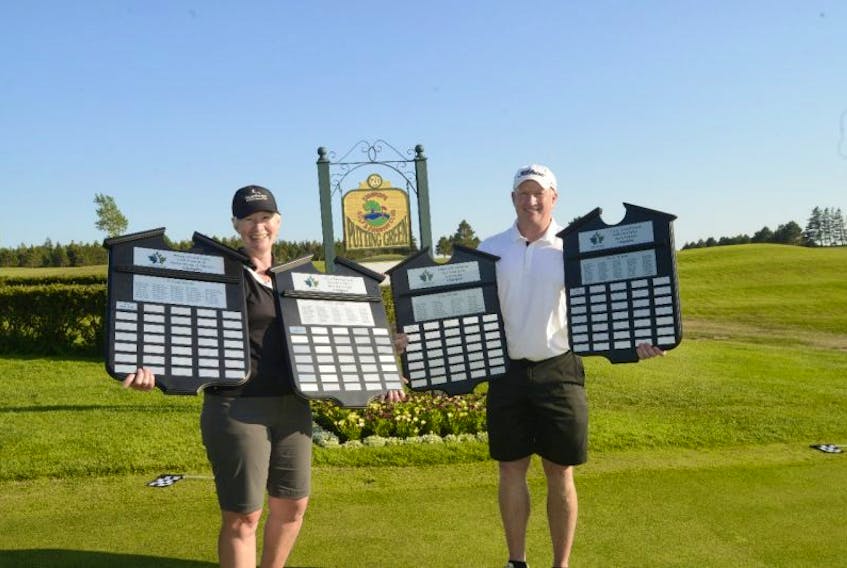 Chris MacLauchlan, left, and Tim Yorke, will soon have their names engraved on these plaques after winning the 2017 Cooke Insurance Amateur Golf Championship Sunday in Stanhope.