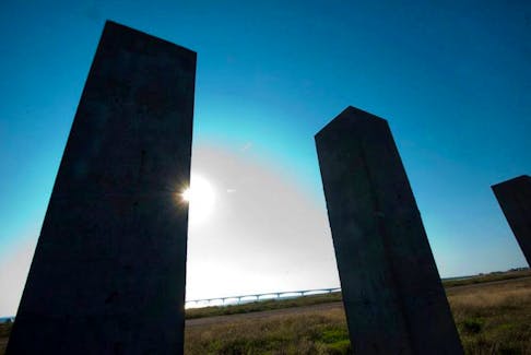 Cement pillars are sillhouetted by the afternoon sun in the former fabrication yard for the Confederation Bridge in this Guardian file photo.