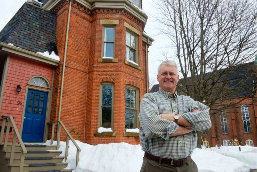 Angus Orford stands outside his heritage property, the Houle House at 96 Prince Street. Orford and Karen Rose received a heritage award from the city after performing a number of renovations to the property while keeping its historical aspects. Orford also thanked a number of contractors and construction companies who helped with the many enhancements to the home.