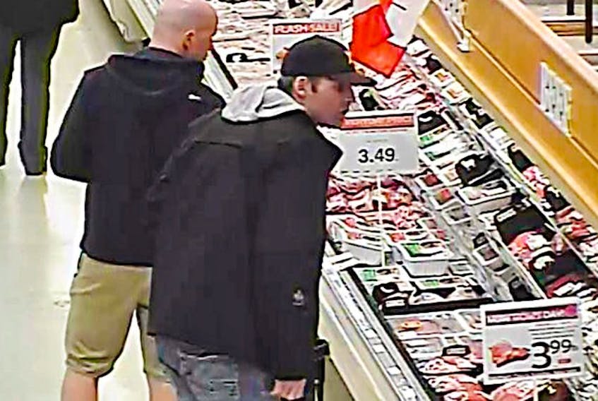 Charlottetown Police Services is asking the public to help put a name to the man at centre holding the shopping basket.