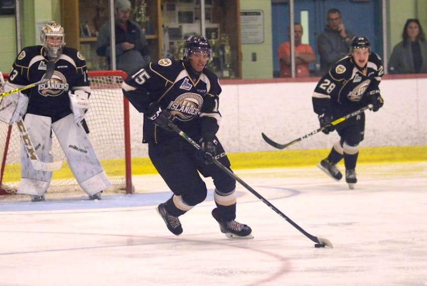 Charlottetown Islanders captain Pierre-Olivier Joseph brings the puck up the ice in a training camp inter-squad game earlier this year in Cornwall.