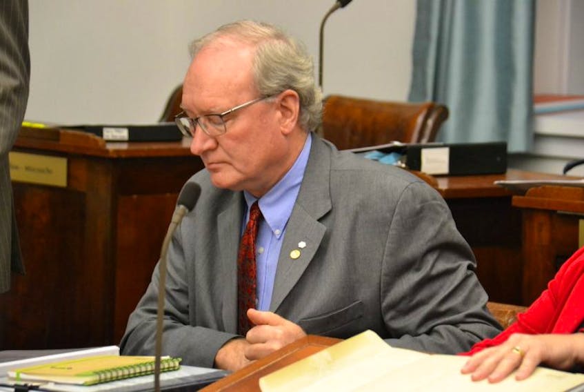 Wade MacLauchlan prepares for a session of the legislature in this Guardian file photo. He said in the legislature Thursday neither he nor his minister will be naming officials involved in the deleted e-gaming emails.