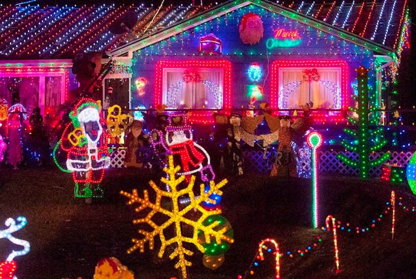 ['The residents of North Rustico spare no effort to decorate the community for Christmas and there seems to be a real competition as to who can put up the most lights.']