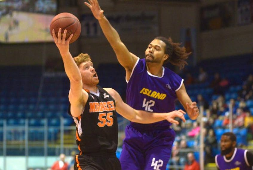 Moncton Miracles forward Russell Byrd, left, gets called for an offensive foul against Island Storm forward Robert Nortmann during Sunday's National Basketball League of Canada contest.