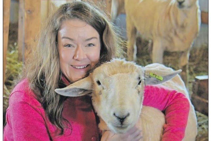 Diana the corriedale gets an affectionate hug from sheep farmer Jennifer Taran at Harmony Meadow Farm in this Guardian file photo.