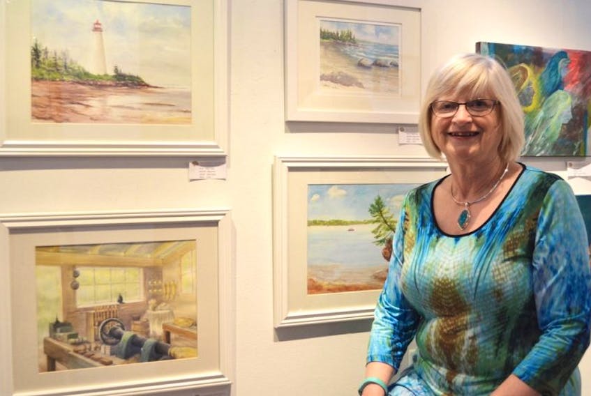 Artist Kathy Stuart shows her collection of plein-air paintings. They are part of the P.E.I. Seniors College Group Art Show at the Gallery @ The Guild. The show opened last Wednesday and will hang until June 4.