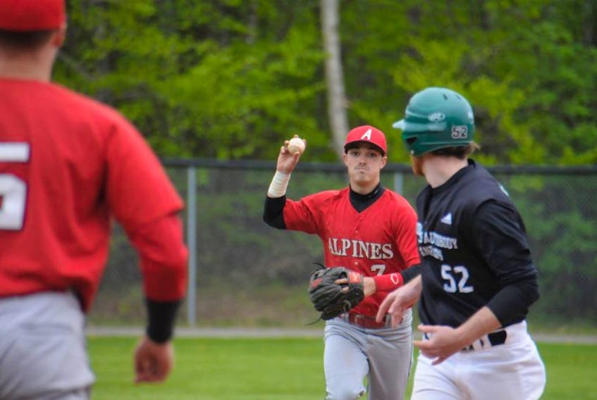 Saint John Alpines shortstop Adam Clark, centre, chases Brody McDonald back towards first after McDoanld was picked off Saturday druing the second inning of the first game of a New Brunswick Senior Baseball League doubleheader at Memorial Field.
