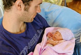 Proud dad Justin Mullen cradles his new daughter Rosalie, who was P.E.I.’s Christmas Day baby, coming into the world around 7:30 p.m. on Dec. 25 at Prince County Hospital in Summerside.