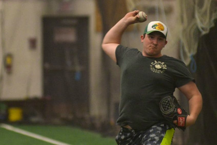 Brett Hicken throws some pitches during a P.E.I. Junior Islanders practice in April in Stratford.