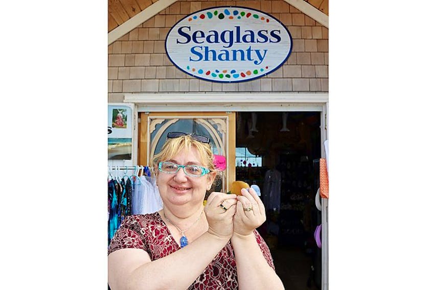 Patricia McLean-Ettinger, who runs P.E.I. Seaglass Shanty on the Souris boardwalk, says there’s no better place in P.E.I. to find seaglass than along Souris Beach. It is  also becoming known, however, for a more troubling issue, broken glass which she says is coming from an old nearby dump.