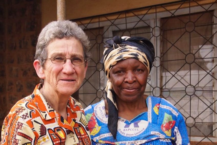 Sister Cecile Buote, left, is shown with one of the women in Cameroon who she was able to help.