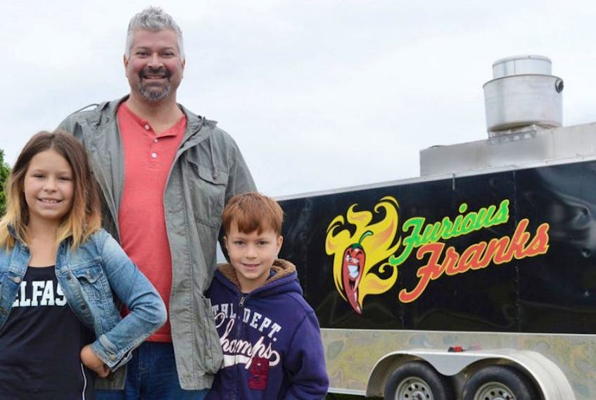 Frank Buffa moved his family, wife Marta and two children, Sofia, left, and son Nino to P.E.I. two years ago. A little over a week ago he opened a food truck called Furious Franks on the Trans-Canada Highway in Belfast. Needless to say, business has been booming.