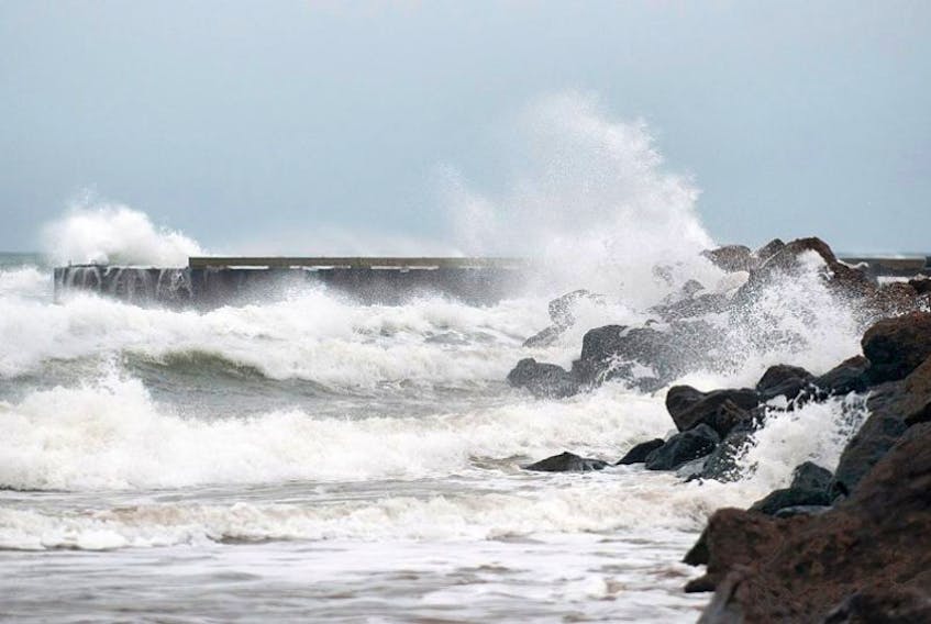 Waves pound the breakwater at North Rustico during a violent wind storm last January in this Guardian file photo. Environment Canada has issued a wind warning for Prince Edwrd Island predicting winds gusting to 90 km/h beginning before morning Friday.