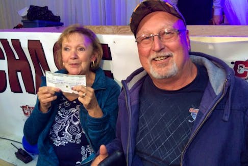 Marg and Don Gorman of Chamberlains with their $2,605,451 cheque.