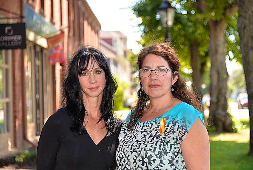 Amanda Brazil, left, and Pat Doyle of the Canadian Mental Health Association’s P.E.I. division are shown in Charlottetown. They presented an update on the P.E.I. Suicide Prevention Strategy on Tuesday.