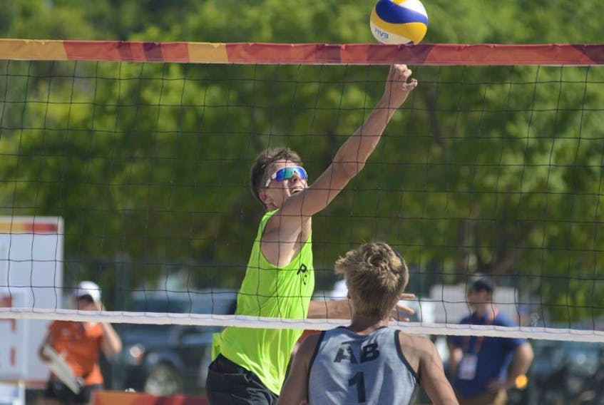 Tynan Murphy prepares to return the ball during beach volleyball action Sunday at the Canada Games in Winnipeg.