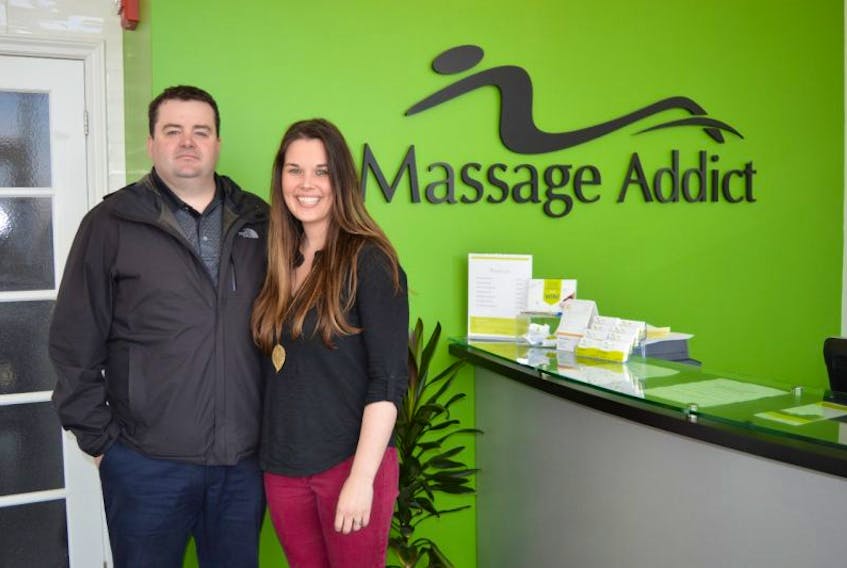 Trevor MacDonald, left, owner of Massage Addict in Charlottetown, and his wife, Kara MacDonald, are hoping that an open house will garner public interest in the field of massage therapy. MacDonald said he is having a hard time finding registered massage therapists and is offering a tuition rebate program in addition to guaranteed employment as an incentive to take the program. 
