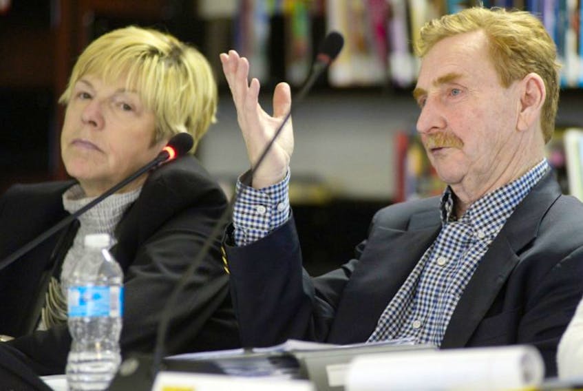 Gerard Mitchell, chairman of the Electoral Boundaries Commission, speaks during one of the commission’s meetings seeking public at East Wiltshire. Next to Mitchell is commissioner Lynn Murray.
