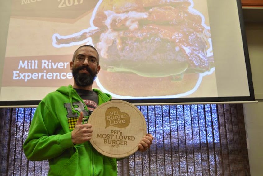 Mill River Experience chef Stephen Wilson shows off his plaque for winning the P.E.I. Burger Love's most loved burger for 2017. 