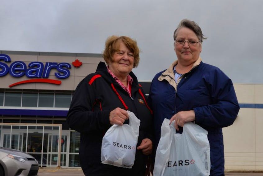 Rena Gaudet, left, and Bev Cornish visited the Charlottetown Sears store on Tuesday. They said it was disappointing to hear that the company is seeking to liquidate all of its assets and stores.