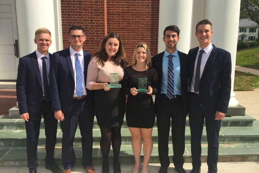 UPEI business students, from left, Callum Wood, Alex Dunne, Sydney Gallant, Shanna Blacquiere, Zach Geldert and Jacob Ezeard were members of the first-place team in a case competition last month at Acadia University. 