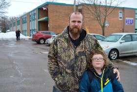 Ben McInnis and his son Cash, who is in Grade 3 at St. Jean Elementary School in Charlottetown, said teachers and students at the school came to the families aid when his wife, Jenn, was diagnosed last year with acute myeloid leukemia. They don’t want to see the school closure this year.

