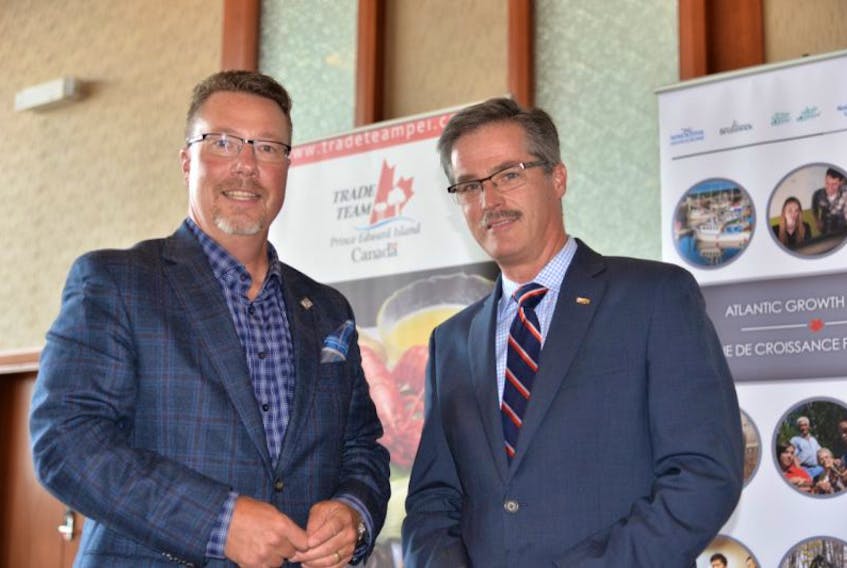 Scott Ferris, left, director of global trade services with Innovation P.E.I., and Peter Hall, chief economist with Export Development Canada, were among 160 people who attended Export Day on Thursday.