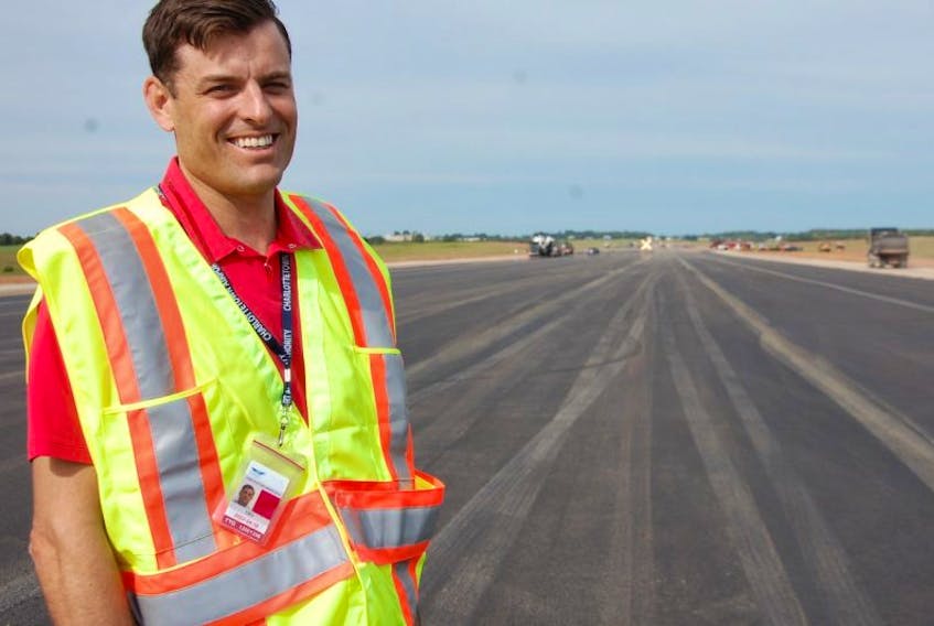 Doug Newson, CEO of the Charlottetown airport, gave media a tour Thursday of the $7 million construction project to extend the smaller of the airport's two runways.