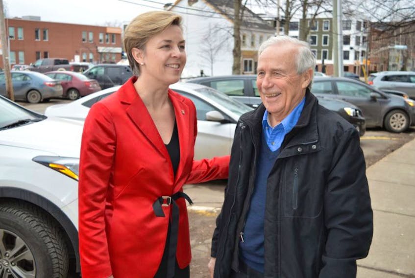 Conservative Party of Canada leadership hopeful Kellie Leitch points to a spot on an old P.E.I. plot map where her family had land in Souris. The discovery was made with the help of Garth Staples, a volunteer with Leitch’s campaign team.