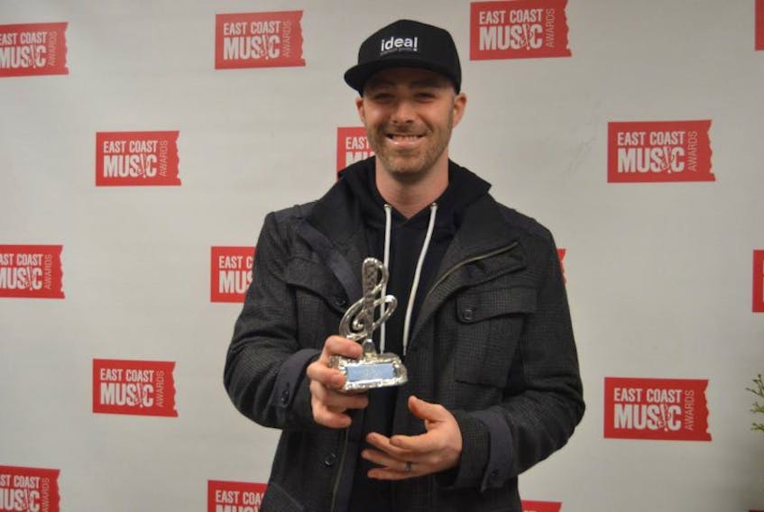 Enfield, N.S., rapper Classified shows off his ECMA for song of the year. 