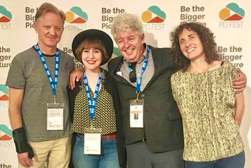 Environmental panel members meet after their presentation at the P.E.I. Fest this past weekend. From left are Jamie Redford, Redford Foundation, ‘Chasing Coral’ collaborator, Slater Jewell-Kemker, ‘Inconvenient Youth’, John Hopkins, ‘Bluefin’ director, and Mille Clarkes, director of ‘Island Green’.