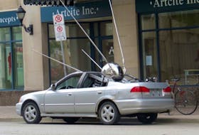 Hamilton artist Brandon Vickerd has created “Sputnik Returned 2” a replica of Sputnik, the first man made satellite to orbit the earth. It’s installed as if it has crash-landed into a parked sedan.
