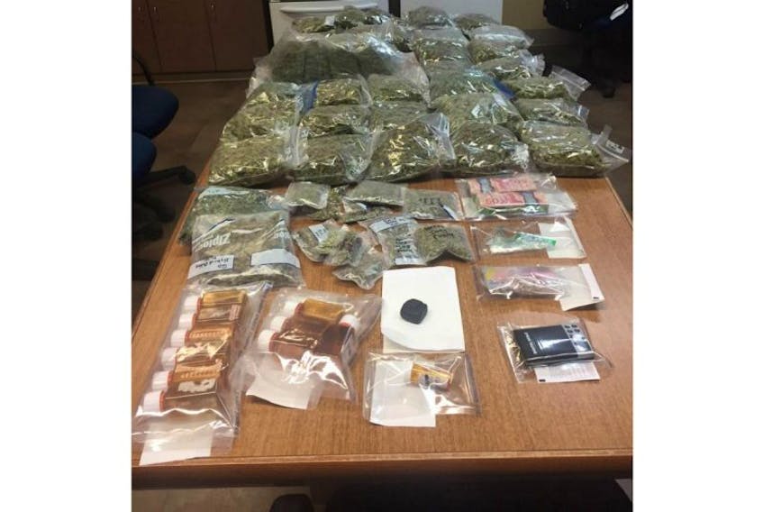 Police seized 21 pounds of marijuana, $10,000 in cash and quantities of hashish, methadone and OxyContin during a raid of a residence in Mount Stewart on May 24. A 34-year-old man is in custody and will answer to the charges June 5. 