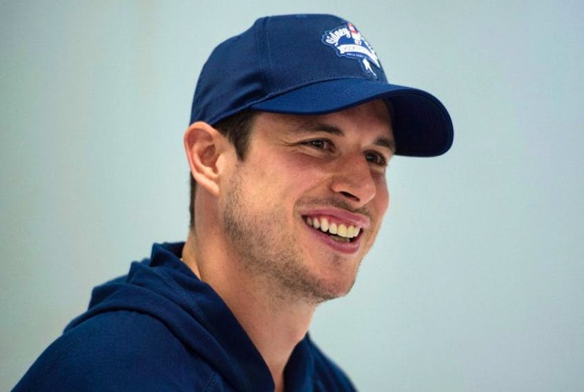 Pittsburgh Penguins' Sidney Crosby laughs while speaking to reporters during a press conference in Halifax on Wednesday, July 12, 2017. 