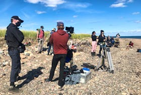 Cast and crew prepare for a scene in director and writer Shelley Thompson's first feature, Dawn, Her Dad and the Tractor. The Nova Scotia film recently became the first local feature to complete shooting under the health guidelines required by the COVID-19 pandemic.