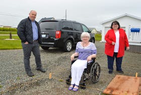 Wendy Littlejohn, centre, at her home in New Waterford, with friend Blair Slade of Glace Bay, and Pam Leader, executive director of the Savoy Theatre in Glace Bay. After suffering a stroke in March and no longer able to drive, Littlejohn donated her van to the Savoy Theatre. Sharon Montgomery-Dupe/Cape Breton Post
