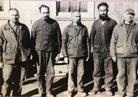 Group portrait of male internees at Camp Ripples in New Brunswick, including Italian Canadian internees. On the far left is Felice Martiniello, from Sydney, Nova Scotia. Public domain